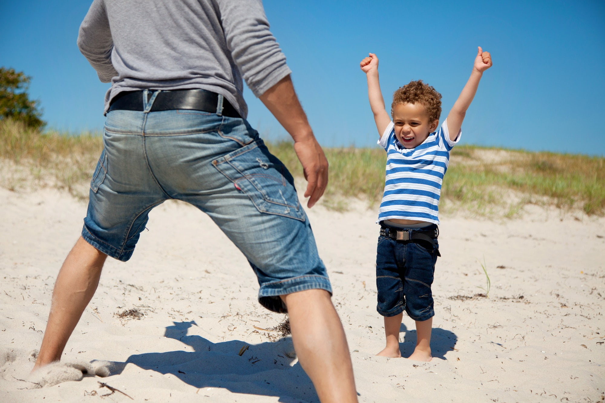 Energetic Kid Raises Arms